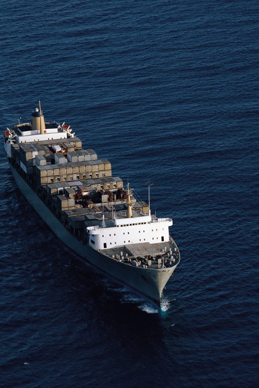 Container ship carrying cargo across the ocean