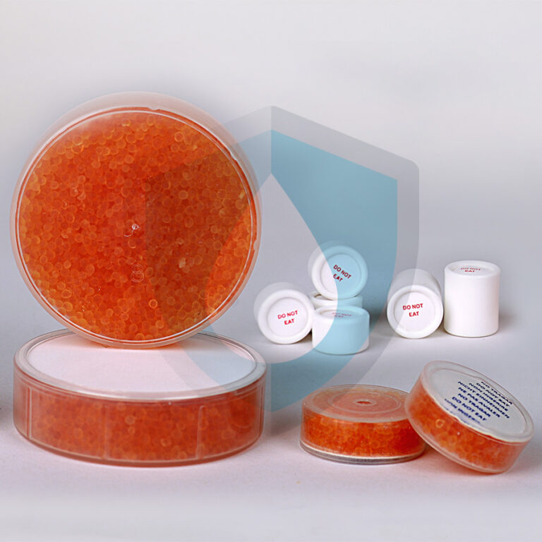 Orange indicating silica gel desiccant in round vented containers marked Do Not Eat