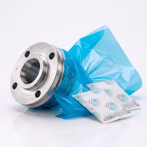 Stainless steel flange protected with a blue VCI bag and VCI emitter sachets