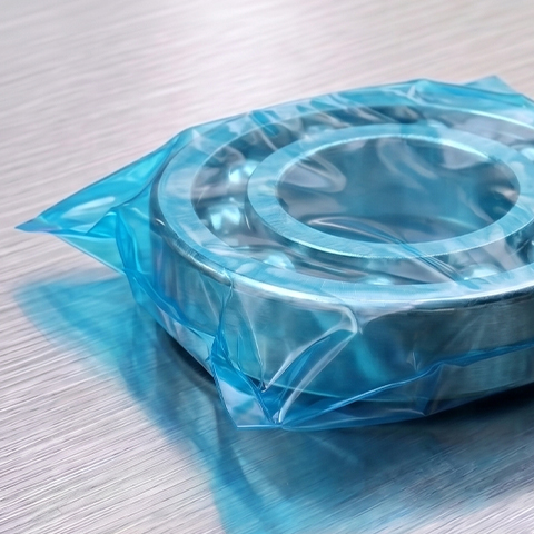 Steel ball bearing sealed in blue VCI film for corrosion protection